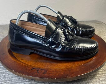 Bass herenschoenen, zwarte leren loafers met kiltie en kwastjes, brogue-details, instappers.