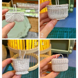 May include: Four miniature white woven baskets are shown, each with a handle. The baskets vary in shape and design, demonstrating different weaving patterns and handle styles. The baskets are held by a person's hand, highlighting their small size and intricate details.