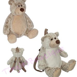 May include: A plush teddy bear backpack in shades of brown and tan. The bear has a brown nose and a cream-colored belly. The backpack features adjustable straps and a zipper closure. The bear is approximately 18 inches tall.