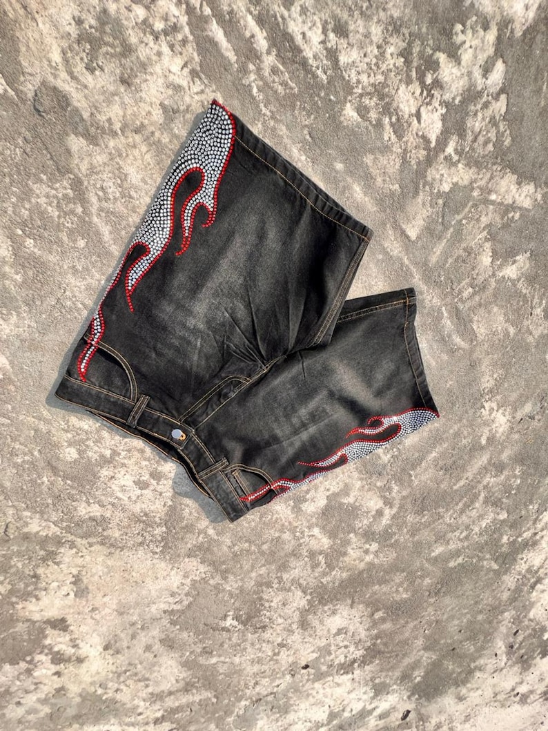 y2k shorts
flame shorts
rhinestone shorts
baggy jorts
streetwear shorts
skater shorts
black denim shorts
y2k fashion
flame jorts
hip hop shorts
mens jorts
womens jorts
oversized shorts