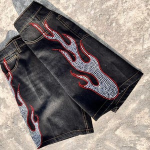 y2k shorts
flame shorts
rhinestone shorts
baggy jorts
streetwear shorts
skater shorts
black denim shorts
y2k fashion
flame jorts
hip hop shorts
mens jorts
womens jorts
oversized shorts