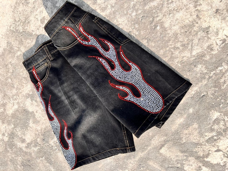 y2k shorts
flame shorts
rhinestone shorts
baggy jorts
streetwear shorts
skater shorts
black denim shorts
y2k fashion
flame jorts
hip hop shorts
mens jorts
womens jorts
oversized shorts
