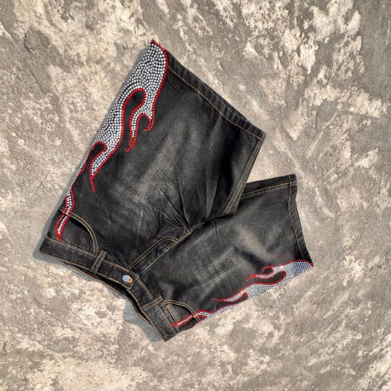 y2k shorts
flame shorts
rhinestone shorts
baggy jorts
streetwear shorts
skater shorts
black denim shorts
y2k fashion
flame jorts
hip hop shorts
mens jorts
womens jorts
oversized shorts