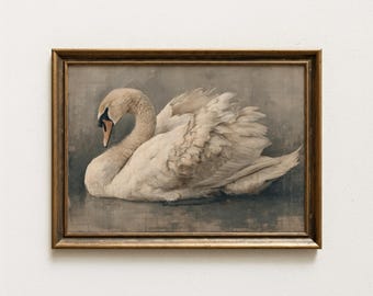 Può includere: Una stampa d'arte incorniciata raffigurante un cigno bianco con piume dettagliate che riposa su uno sfondo grigio tenue. Il cigno ha un lungo collo curvo e un becco scuro con accenti arancioni. L'opera è racchiusa in una semplice cornice color oro.