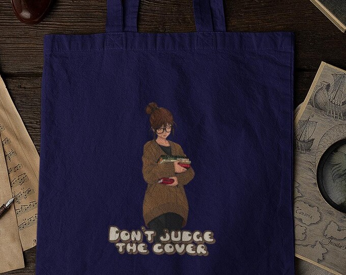Booklover Don't judge the cover Organic Cotton Tote Bag - Sustainable organic cotton tote bag for book lovers with a statement