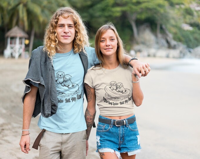 Otter Raft Rules Softstyle Unisex T-Shirt | Sustainable otter shirt in a minimalist style | Animal lovers, adventurers, and water lovers