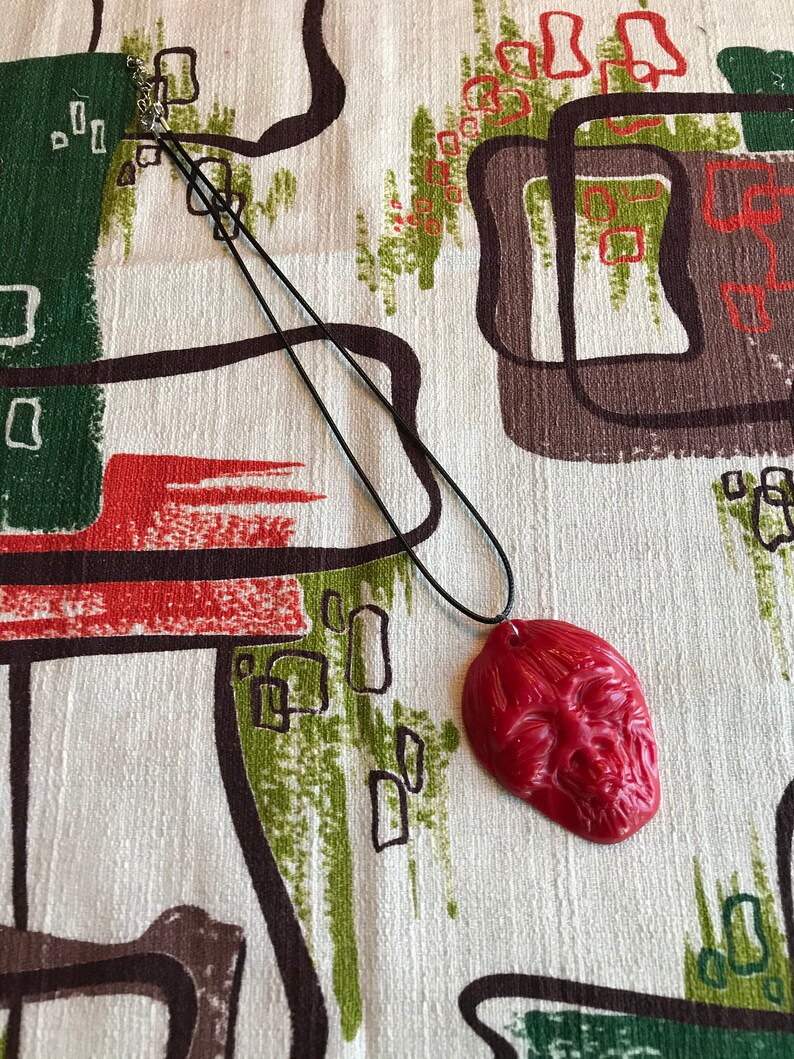 Shrunken Head Tiki Necklace Handmade Hand Poured Red Resin Halloween Oddities Spooky Retro Style