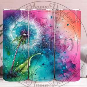 May include: A tumbler featuring a vibrant watercolor design of a dandelion. The artwork showcases a dandelion with a teal center, green stem and leaf, and white seed heads against a colorful background of pink, orange, and teal. The text "Mama Designed" is visible.