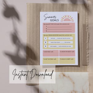 May include: A printable summer goals worksheet with the text "Summer Goals" and "Instant Download". The worksheet includes sections for fun goals, brain booster goals, and prompts for kindness, movement, outdoor activities, and habit building.