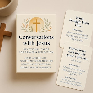 May include: A cream-colored box set of "Conversations with Jesus" devotional cards. The box features a gold cross and text. Two cards with text are visible, including "Jesus, Struggle With This..." and "Peace I leave with you; My peace I give you."