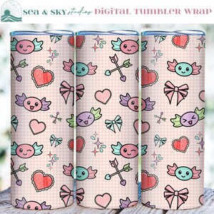 May include: Digital tumbler wrap featuring a repeating pattern of cartoon candies, hearts, bows, and arrows on a pink gingham background. The text "SEA & SKY studios DIGITAL TUMBLER WRAP" is at the top. The design is suitable for Valentine's Day.