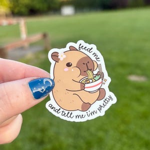 Feed Me and Tell Me I&#39;m Pretty 2 Inch Water-Resistant Sticker – Durable Vinyl Bookish Decal, Reader Gift, Kindle Sticker, Matte Finish