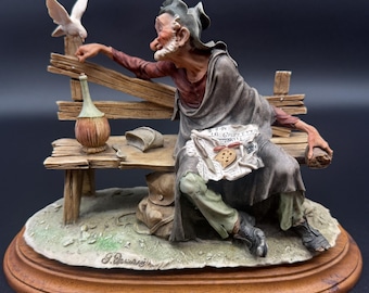 Giuseppe Armani Tramp Feeding Dove Figurine, Italian Man on Bench Sculpture, Wood Base