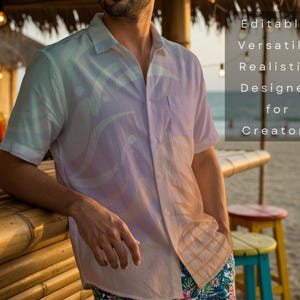 May include: A short-sleeved button-down shirt in pastel colors with a subtle pattern. The shirt is worn with floral print shorts. The image includes the text: Editable. Versatile. Realistic. Designed for Creators.