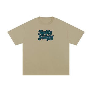 Reality is Fantasy™ Trippy Illusion T-Shirt | "Reality = Fantasy" | Trippy Graphic Streetwear | Retro Bold Typography Shirt |Unisex Boxy Fit