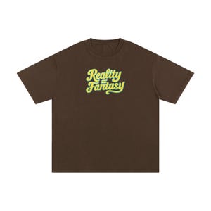 Reality is Fantasy™ Trippy Illusion T-Shirt | "Reality = Fantasy" | Trippy Graphic Streetwear | Retro Bold Typography Shirt |Unisex Boxy Fit