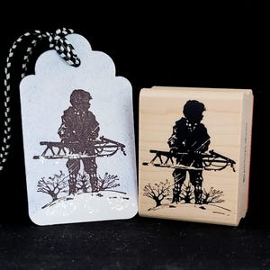 boy with a sled