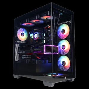 May include: A black computer tower with a glass side panel, showcasing internal components. The case features multiple fans with vibrant, multicolored LED lighting. The graphics card is illuminated with pink and purple lights, and the text "ROG of GAMERS" is visible.