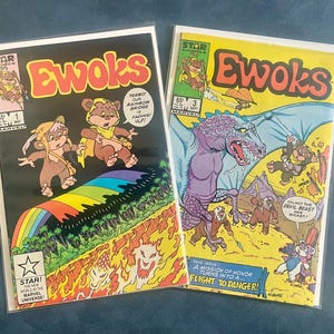 May include: Two vintage Ewoks comic books. One features a rainbow and the text "TeeBo Our Rainbow Bridge is Fading Up!" The other shows a purple dragon and the text "A Mission of Honor Turns Into a Flight to Danger!"