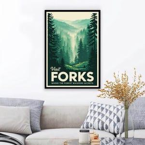 May include: A framed poster with a forest scene in shades of green and blue. The poster reads "Visit Forks" with the tagline "Where the forest whispers secrets." The artwork depicts a lush forest with tall trees and a misty background.