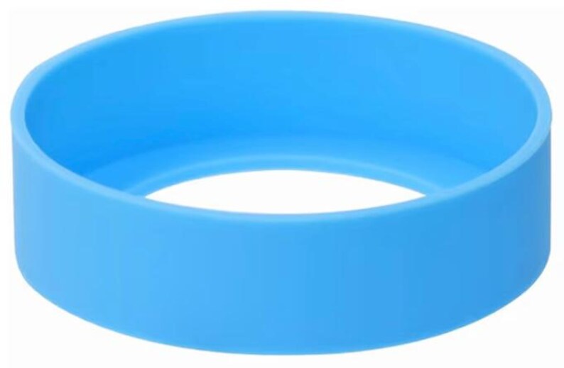 May include: A light blue silicone ring, circular in shape, with a hollow center. The ring is made of a smooth, solid material and is designed to fit around an object. The color is a bright, solid blue.