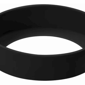 May include: A solid black silicone ring, circular in shape. The band is thick and has a smooth, matte finish. The object is a simple, minimalist design, suitable for various uses.