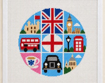 Könnte beinhalten: Eine quadratische Stickleinwand mit einem kreisförmigen Raster aus neun Symbolen, die London darstellen, darunter der Union Jack, ein roter Doppeldeckerbus, eine Telefonzelle, ein schwarzes Taxi, eine Teetasse und Wahrzeichen wie Big Ben.