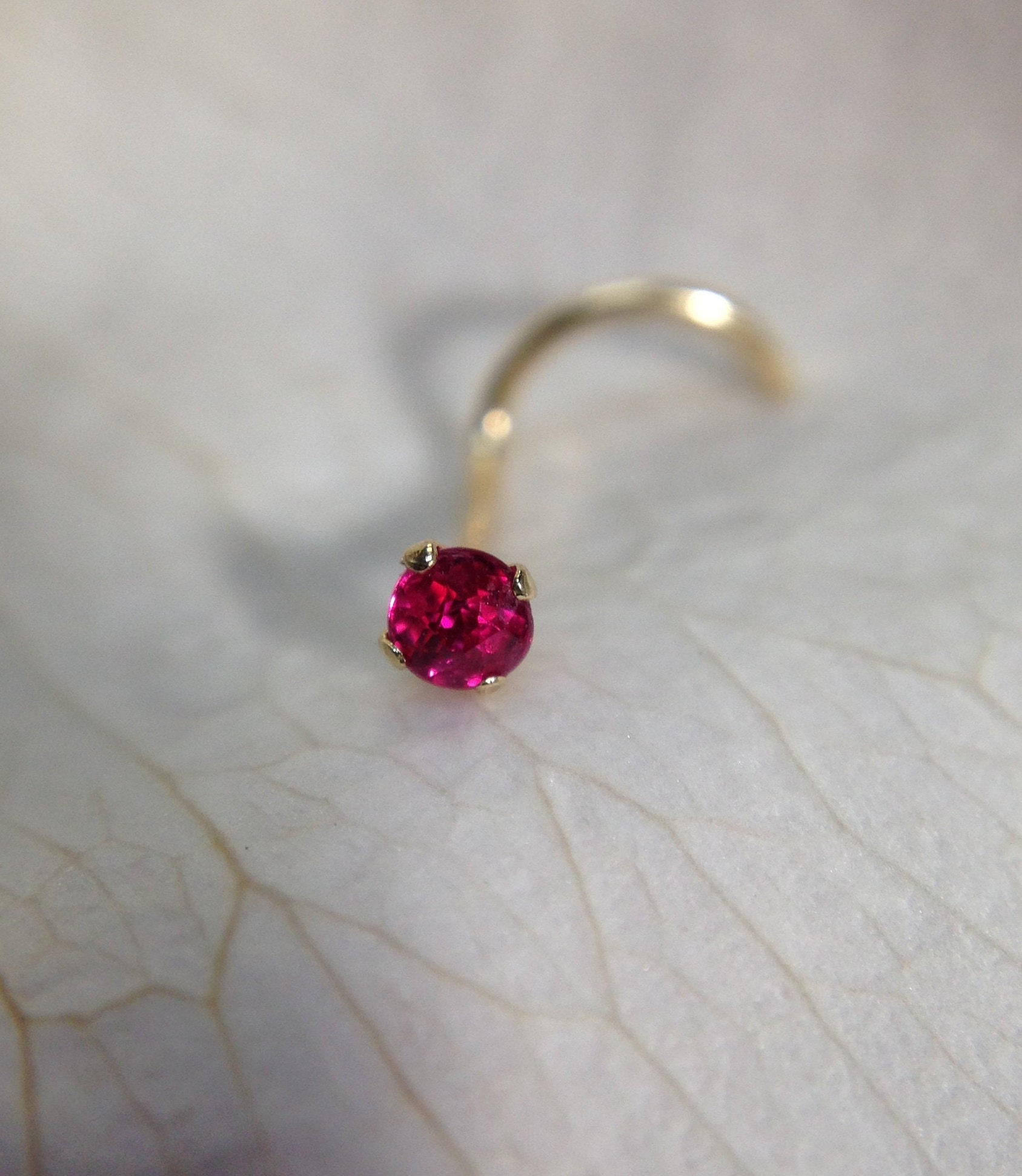 Red diamond shop nose stud