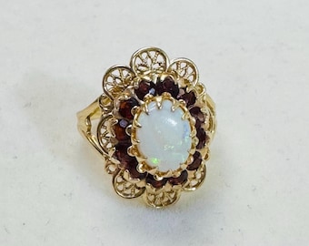 Vintage 14K geelgouden ring met opaal en granaat, maat 5
