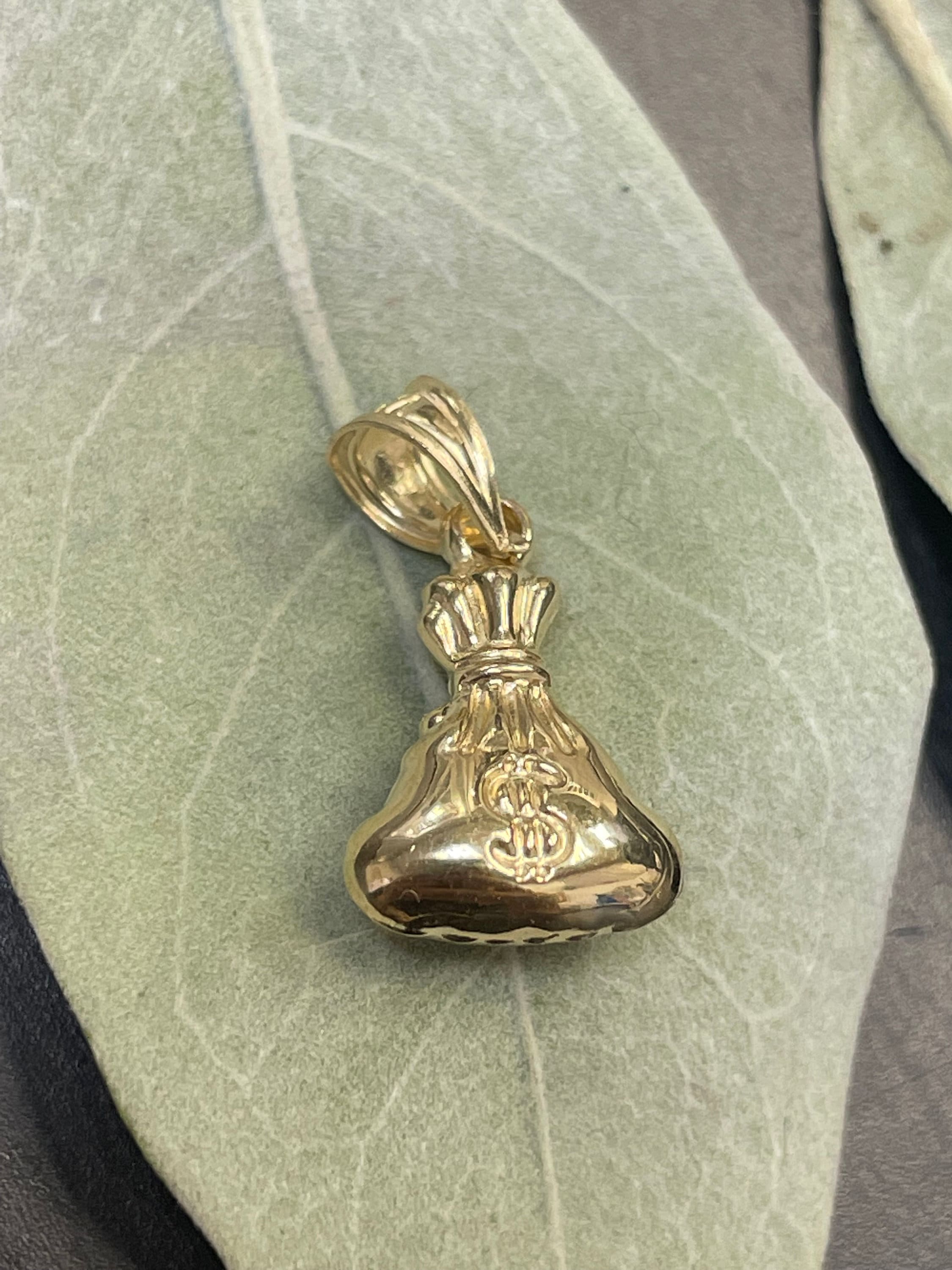 Money bag charm gold hotsell