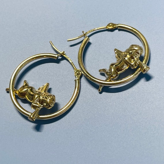 Cherub hoop earrings deals