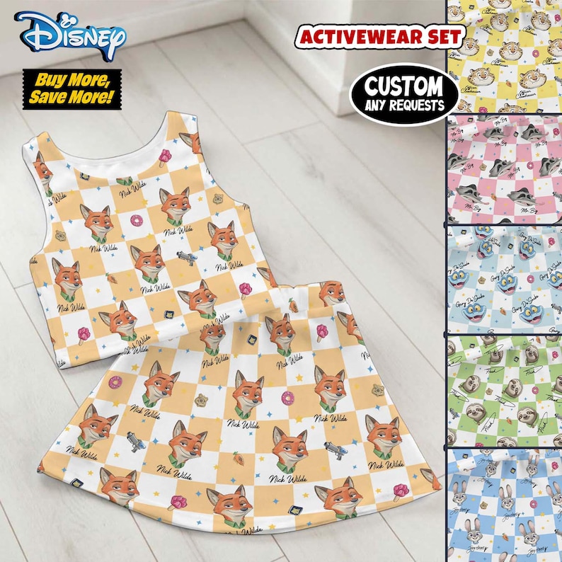 May include: A two-piece activewear set featuring a Nick Wilde design from Disney's Zootopia. The set includes a crop top and skirt with a repeating pattern of Nick Wilde's face, donuts, and guns on a yellow and white checkered background. The set is labeled "ACTIVEWEAR SET".