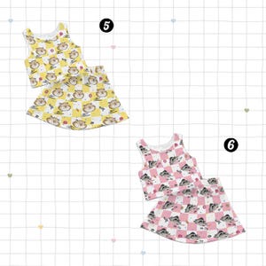 May include: Two matching sets of children's clothing. One set is yellow with a tiger and donut pattern, the other is pink with a raccoon and donut pattern. Each set includes a tank top and a skirt.