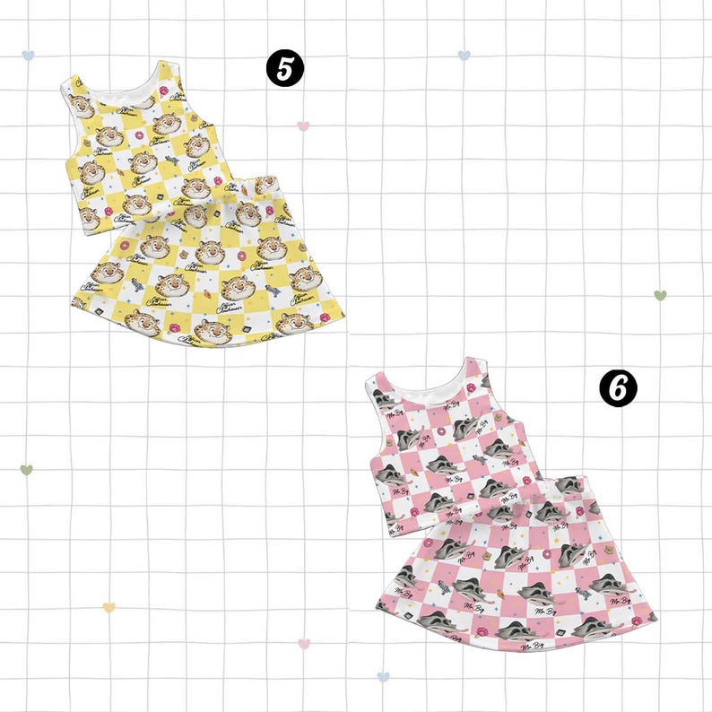 May include: Two matching sets of children's clothing. One set is yellow with a tiger and donut pattern, the other is pink with a raccoon and donut pattern. Each set includes a tank top and a skirt.