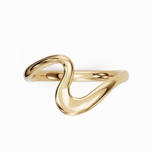 May include: A gold ring with a fluid, abstract design. The ring has a continuous, wave-like shape that curves and loops, creating an elegant and modern aesthetic. The smooth, polished surface reflects light, highlighting the ring's fluid form.