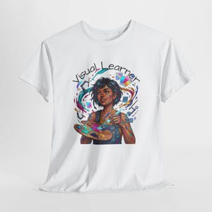 May include: A set of three ceramic mugs with a speckled, matte finish. The mugs are in shades of cream, light gray, and dark gray. Each mug has a simple, minimalist design and a rounded handle. The mugs are likely for coffee or tea.