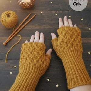 May include: Mustard yellow knitted fingerless gloves with a diamond pattern. The gloves are displayed on a dark wooden surface with knitting needles, yarn, and a candle holder. The image includes a circular text that says "pattern Only".