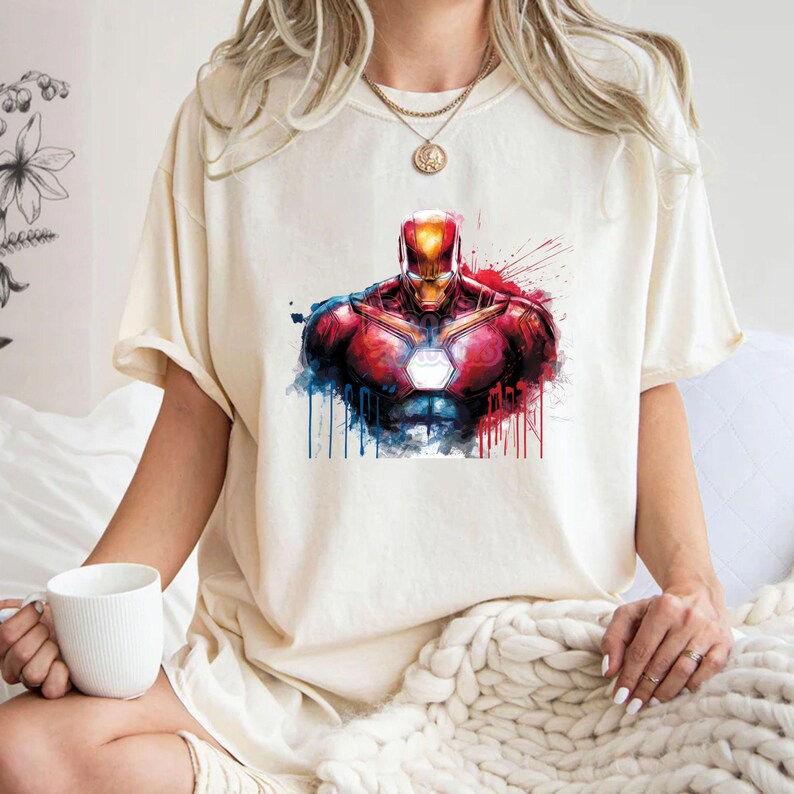 Iron Man PNG featuring glowing arc reactor chest design with red and gold armor, comic style superhero artwork perfect for t shirt printing, sublimation and digital crafts