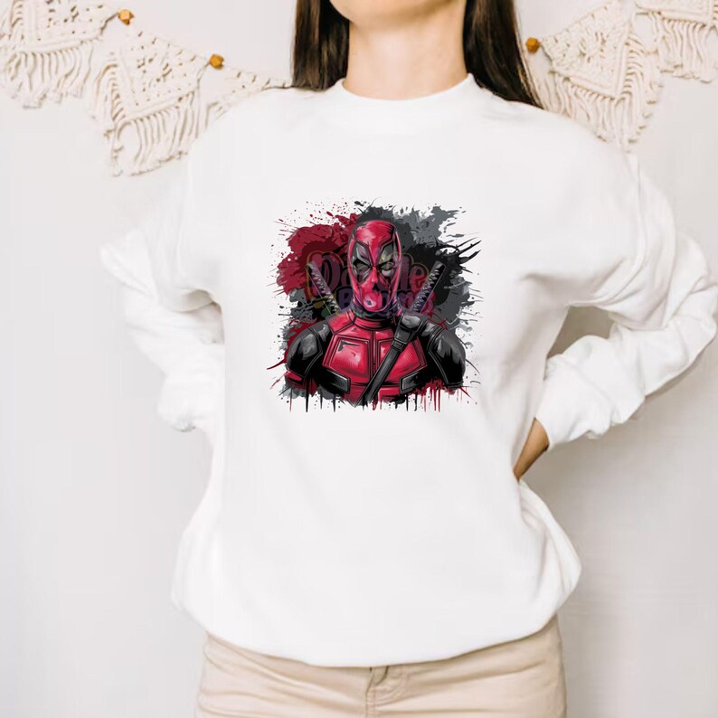 Deadpool PNG clipart design featuring bold red and black superhero character with splatter background, high quality comic style artwork perfect for t shirt printing, sublimation, stickers and digital designs, transparent PNG file ideal for superhero fans, graphic design projects and creative use