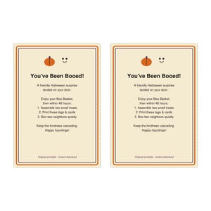 May include: Two identical rectangular printable cards with a cream background, orange and purple borders, and a small orange pumpkin icon. The text reads: You've Been Booed! A friendly Halloween surprise landed on your door. Enjoy your Boo Basket, then within 48 hours: 1. Assemble two small treats 2. Print these tags & cards 3. Boo two neighbors quietly. Keep the kindness cascading. Happy hauntings! Original printable - Instant download.