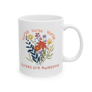 May include: White ceramic mug with a floral design and the text "Nurse Nurse Nurse Nurses are Awesome".