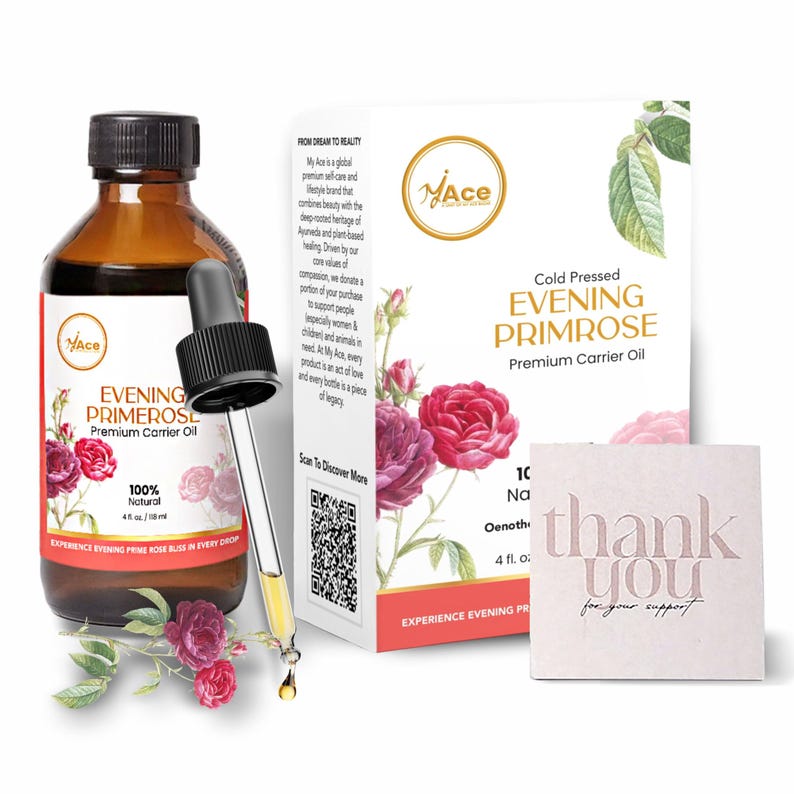 Puede incluir: Una botella de vidrio marr&oacute;n de Aceite Portador Premium de Onagra con un cuentagotas, una caja de producto y una tarjeta de agradecimiento. La caja presenta un dise&ntilde;o floral y el texto "Cold Pressed Evening Primrose". La botella contiene 118 ml de aceite.