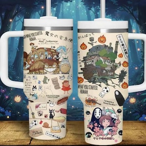 May include: Two white handled tumblers with illustrations from Studio Ghibli films. One features characters from My Neighbor Totoro, the other from Spirited Away. Text includes "What You Started, Human" and Japanese text.