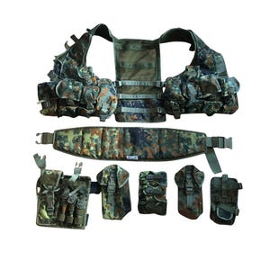 May include: A camouflage tactical vest and belt set. The vest features multiple pockets and pouches, and the belt includes additional pouches. The set is designed for military or outdoor activities.