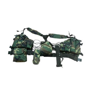 May include: Camouflage tactical vest with multiple pouches and compartments. The vest features a woodland camouflage pattern in shades of green, brown, and black. Includes a canteen and various straps and buckles for adjustment and attachment.