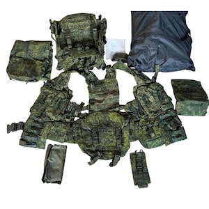 May include: A collection of military-style tactical gear, including vests, pouches, and a backpack, all in a green camouflage pattern. The items are arranged on a white background, showcasing the various components of the set.