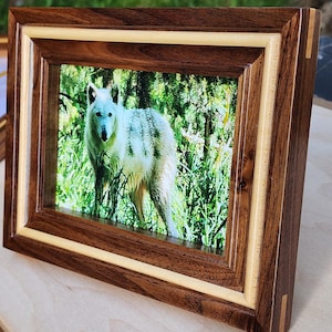 handmade walnut frame with maple inlay