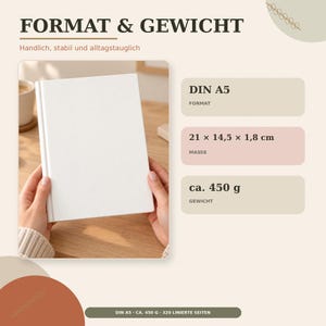 May include: A white notebook with a blank cover. Text on the image includes FORMAT & GEWICHT, DIN A5, 21 x 14.5 x 1.8 cm, ca. 450 g, and 320 LINIERTE SEITEN. The notebook is held upright, displaying its rectangular shape and clean, solid white surface.