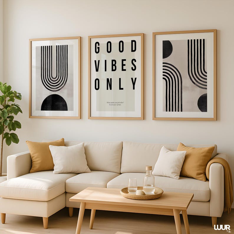 Minimal abstract wall art set of 3 prints designed with curved black lines, geometric shapes, and a bold “GOOD VIBES ONLY” typography poster. Perfect for modern, Japandi, and neutral interiors. This printable artwork adds balance and sophistication to any living room, office, or entryway. High-resolution files for instant download and easy home printing.