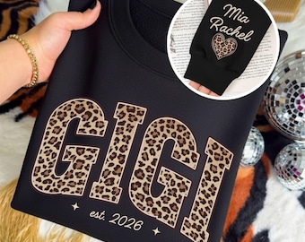 Custom Leopard Gigi Sweatshirt With Kid Name On Sleeve, Personalized Gigi Hoodie, Gift For Gigi, Mothers Day Gift Gigi Est 2026 Sweatshirt
